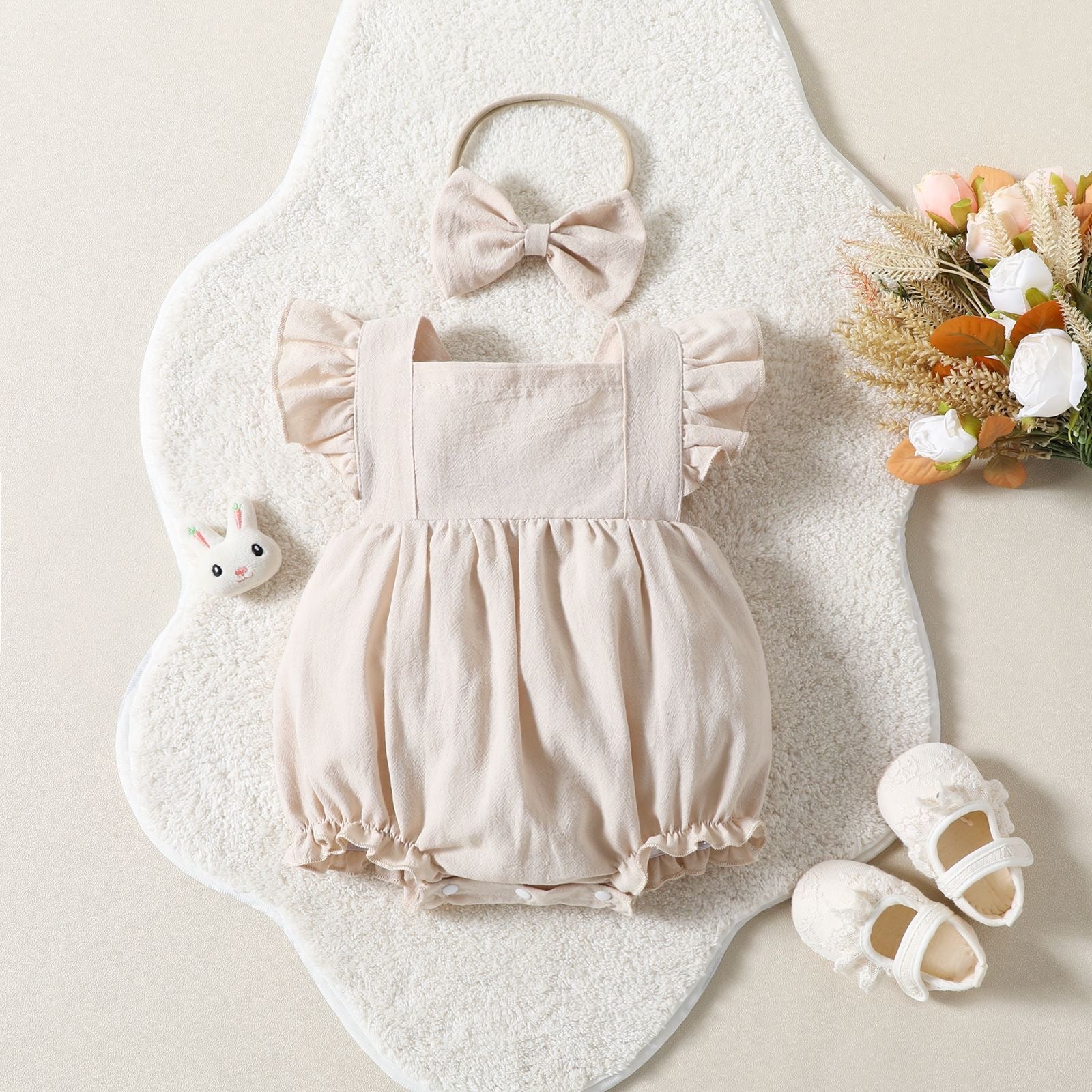 Nude onsie for babies with headband bow